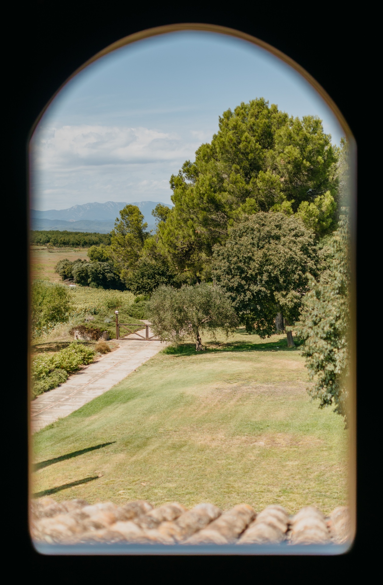 View through arched window at Mas Terrats