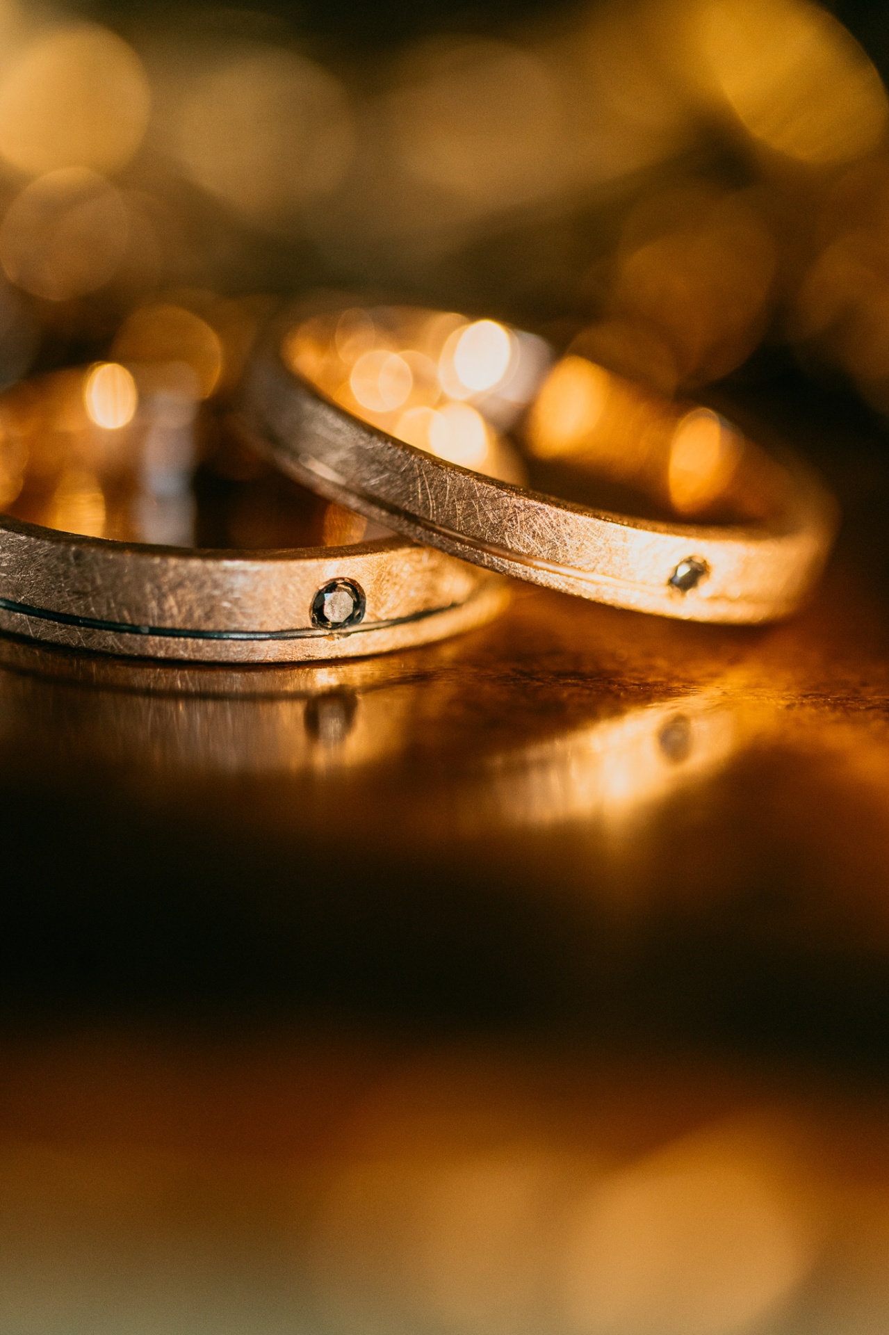 Wedding rings detail shot with golden light